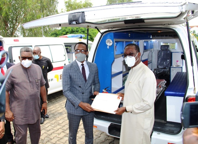 feanyi Okowa receiving three Ambulances Donated by BUA