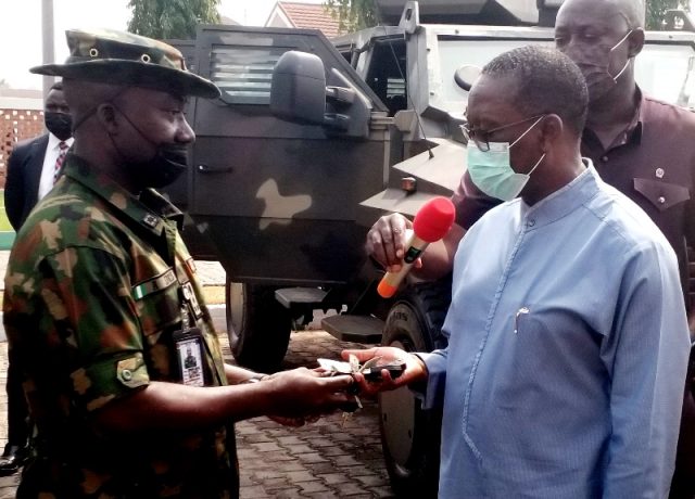 Delta Governor, Senator Dr. Ifeanyi Okowa presenting keys to 3 Armored Personnel Carriers