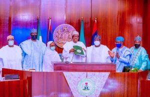 President Buhari signs the Electoral Act Amendment Bill into Law, requests NASS to delete controversial section 84(12)