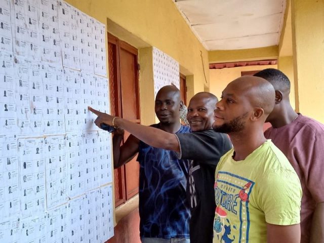 Voters checking their details on the Register of Voters before the recent Ekiti Governorship Election-Photo credit-INEC