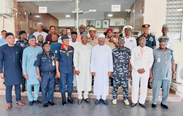 INEC Chairman with members of the National Electoral Logistics Committee