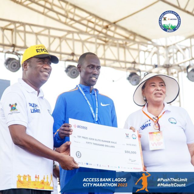 Winner of the Elite Runner Men's Prize,Edwin Kibet Koech of Kenya & Chairperson, Access Bank PLC