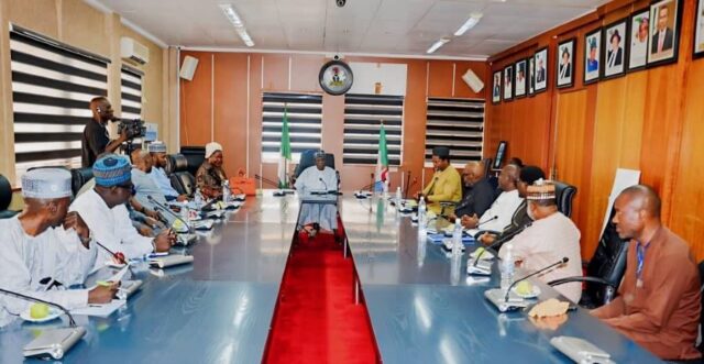 Delegation of Akoko Edo Elites, Hon. Peter Akpatason in conversation with Abubakar Momoh
