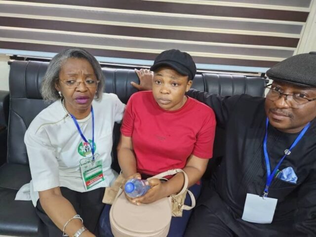 The abducted INEC official, middle with National Commissioner supervising Bayelsa State, Mrs. May Agbamuche-Mbu