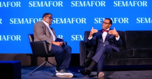 Dr Akinwumi Adesina (right) warns of the impact of non-transparent resource-backed loans on Africa's debt burden