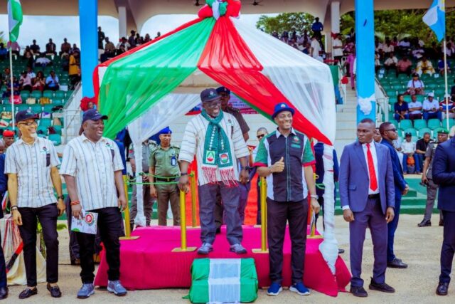 Delta Governor, Sheriff Oborevwori (3rd left), taking the National salute at the May Day celebration in Asaba