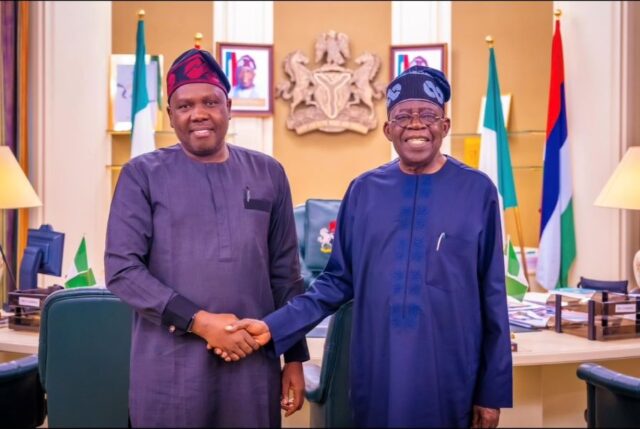 Daniel Bwala with President Tinubu-Photo file
