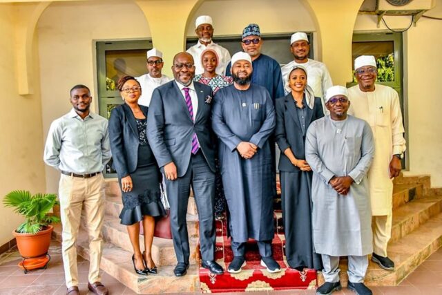 Governor Umaru Bago with Central Securities Clearing System top executives
