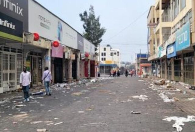 People walk through Goma's commercial district, Democratic Republic of Congo