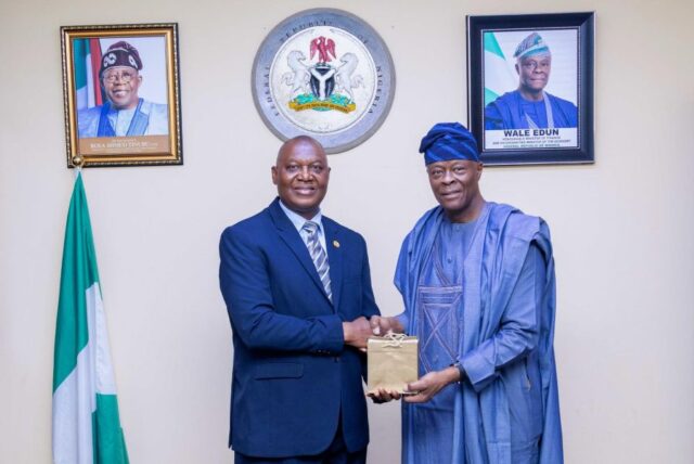 Dr. Abdul Kamara, Director General, Nigeria Country Department presenting the Country Strategy Paper to Finance Minister Wale Edun