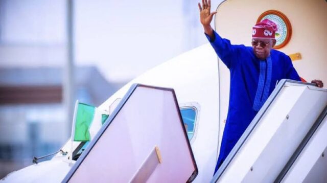 President Tinubu waves from the President Jet