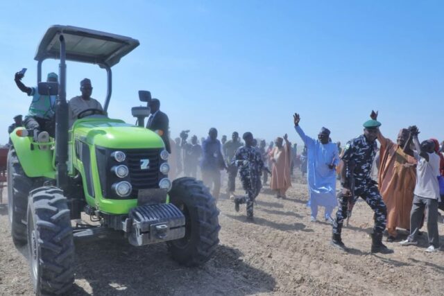 Borno State Governor, Professor Babagana Umara Zulum drives a tractor as he flagged off a Zulum, has flagged off the distribution of critical agricultural inputs