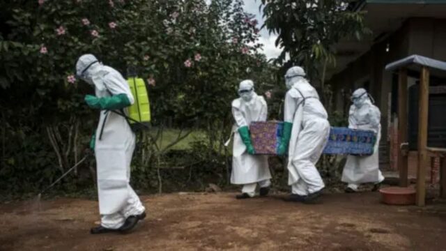 Frontline health workers evacuate Ebola victim in DR Congo