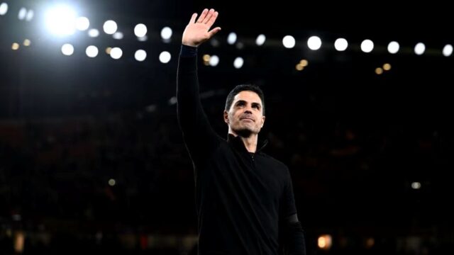 Mikel Arteta Manager of Arsenal waves to the fans after the teams victory