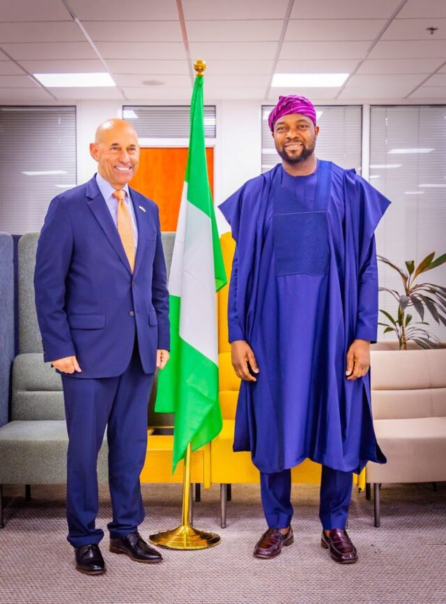 Dr. Bosun Tijani with Frank Garcia