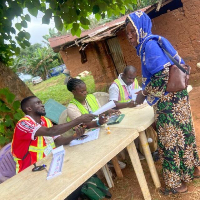 An elderly woman is being accredited to cast her vote during the 2026 Osun governorship election