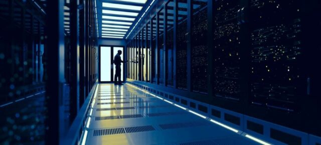 A technician works in a data service centre.