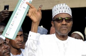 NigeriaDecides2023| President Buhari votes, flashes ballot paper to the world