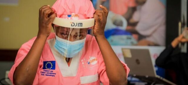 DRC A nurse puts on protective gear to attend to Ebola patients in the eastern DR Congo.
